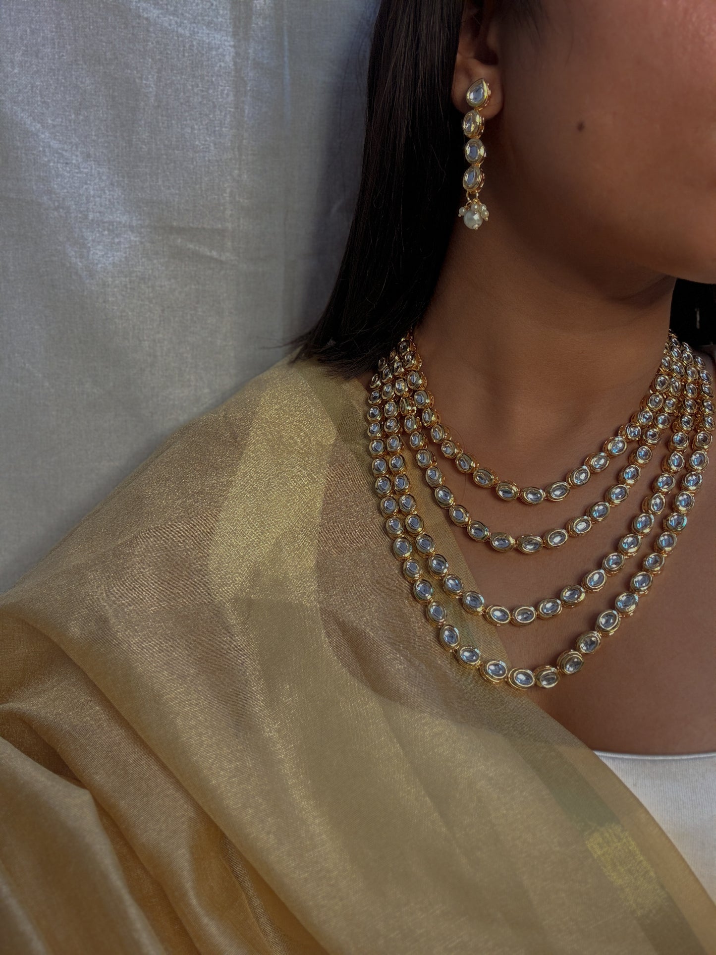 Rani's Regal 4 layered Kundan Necklace with Earrings