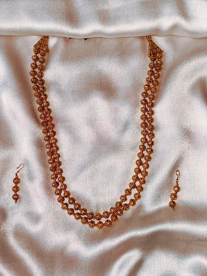 Amber Double Layered Gold Toned Long Necklace